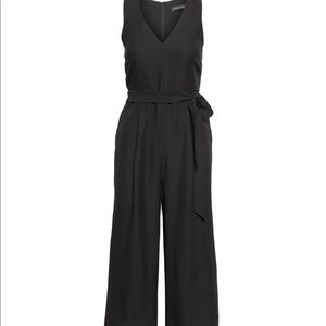 Cropped V-Neck Jumpsuit in Black size 6